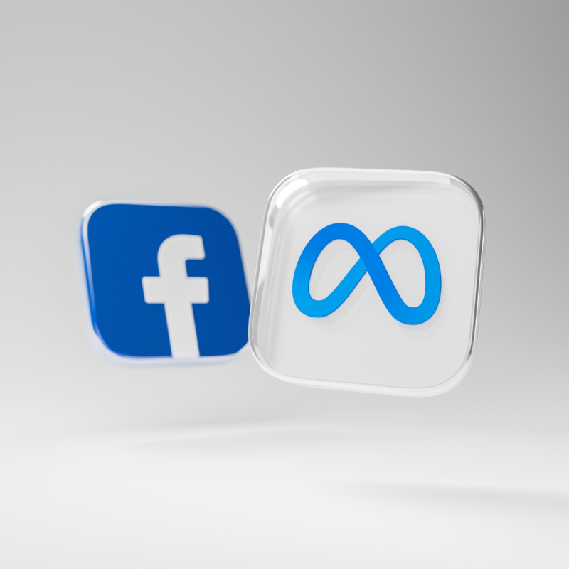 Two floating icons, one with the Facebook logo and the other featuring an infinity symbol, on a gray background.